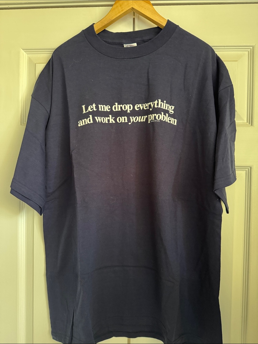 Delta Navy Blue Graphic Tee "Let me drop everything and work on your problem"